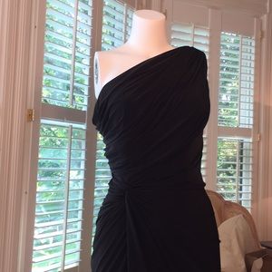 Classic one sleeved black cocktail dress